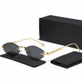 Gold-framed sunglasses with black lenses on a white background, featuring Caterside branding.