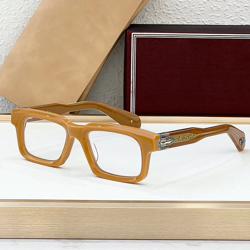 Brown eyeglasses on a white surface with a textured wall background