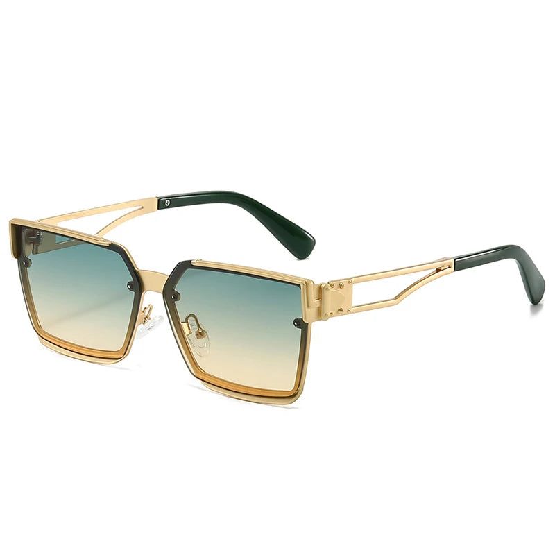 Gold-framed sunglasses with gradient lenses on a white background