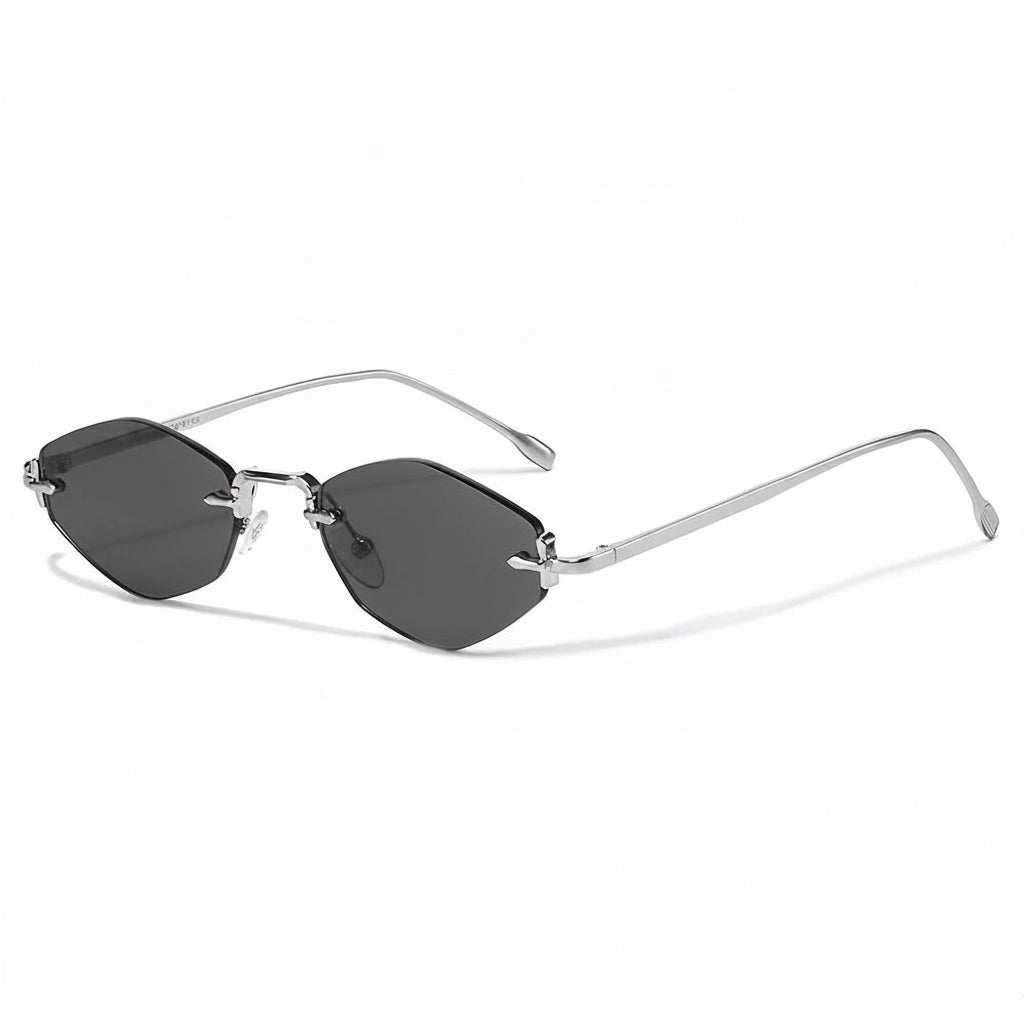 Sunglasses with thin frame and dark lenses on a white background, featuring the Caterside brand.
