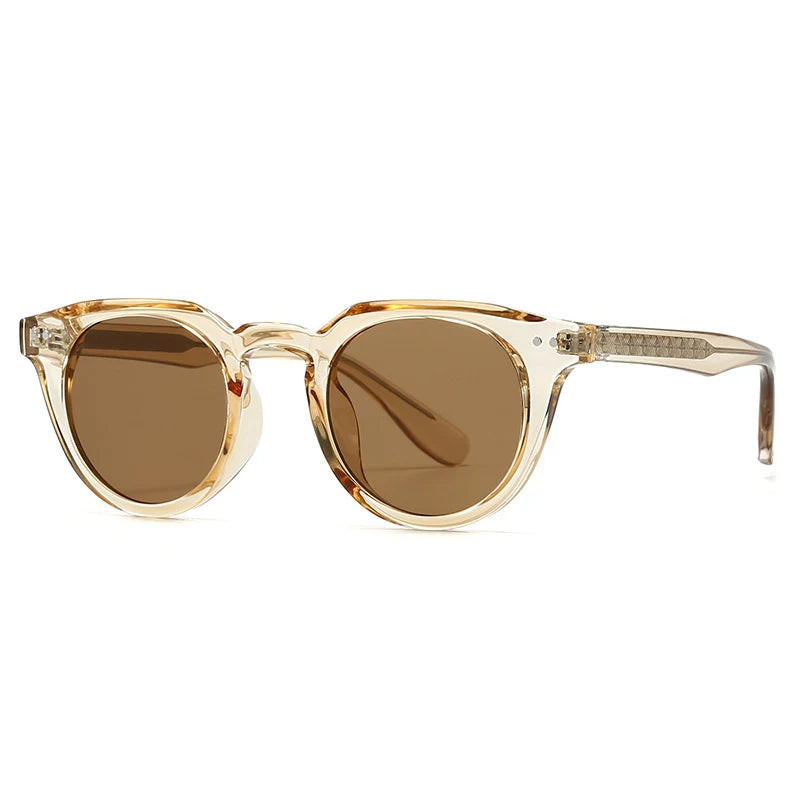 Sunglasses with gold frame and brown lenses on a white background