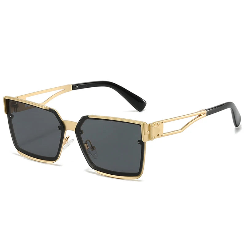 Gold-framed sunglasses with black lenses on a white background