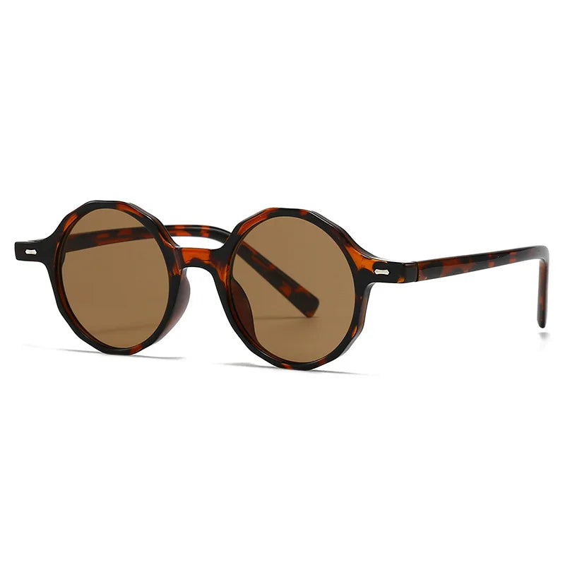 Round sunglasses with tortoiseshell frame and brown lenses on a white background