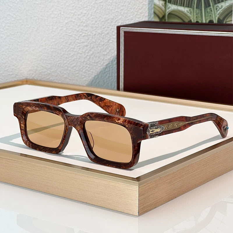 Brown sunglasses with tortoiseshell frame on a wooden surface